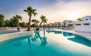 Pool at the sunset - Pareus Beach Resort